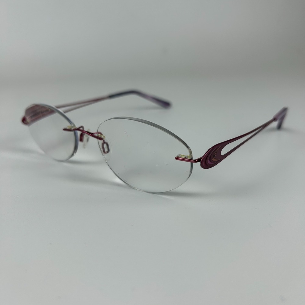 Charmant CH10931 Women's‎ Eyeglasses Frame Brown Metal Oval Rimless 52-19-135 mm